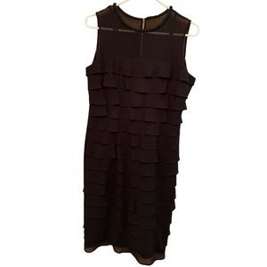 Black ruffle dress with bead detailing at collar. Size 8.